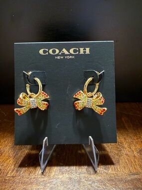 Coach Pave Holiday Bow Huggies Earrings Colored Crystal Stones Gold Tone CG078